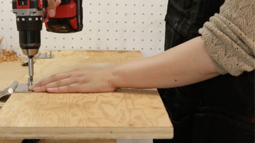 Attach door hinges on to the bench top board, DIY Folding Workbench image 8